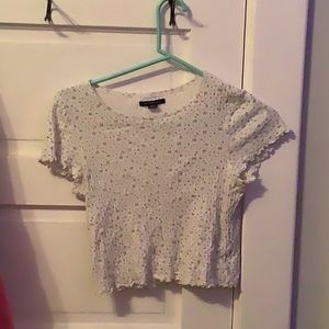white flower cropped top